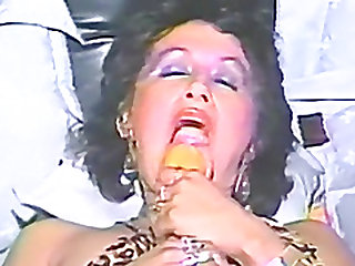 Vintage homemade video of a hot milf fucking her hairy muff with toys